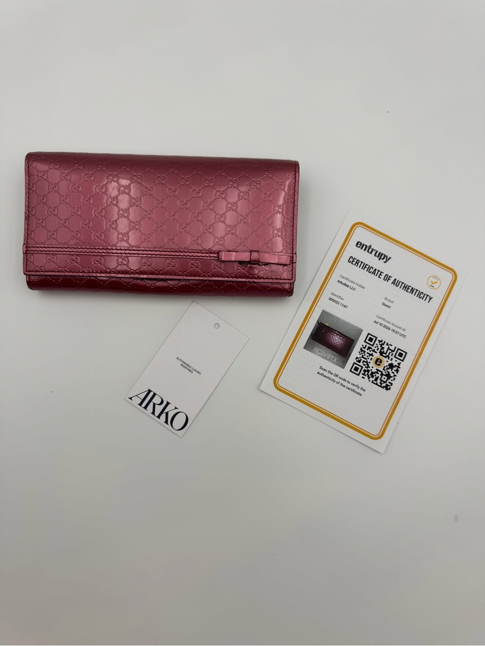 Authentic Gucci Pink Microguccissima Patent Leather Continental Bow Wallet
